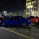 The gang’s all here. Everyone got their pink slips and Eurobeat CDs?